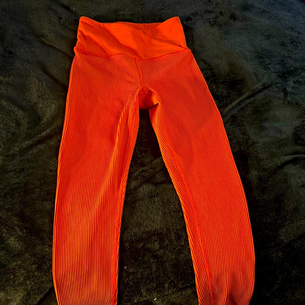 XXS orange leggings never worn